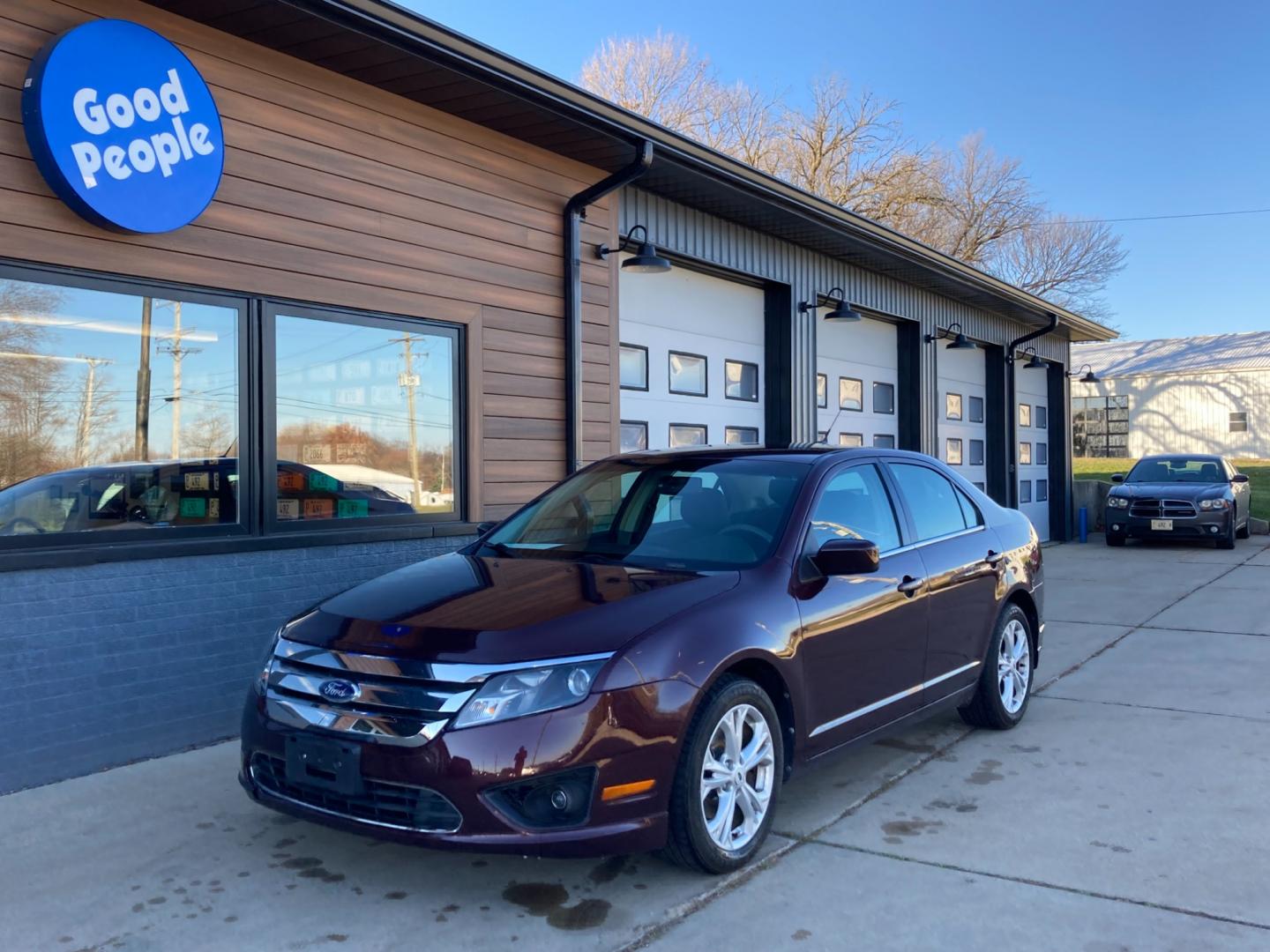 2012 Bordeaux Reserve Met Ford Fusion SE (3FAHP0HG1CR) with an 3.0L V6 DOHC 24V engine, located at 1800 South Ihm Blvd, Freeport, IL, 61032, (815) 232-5543, 42.278645, -89.607994 - Photo#3